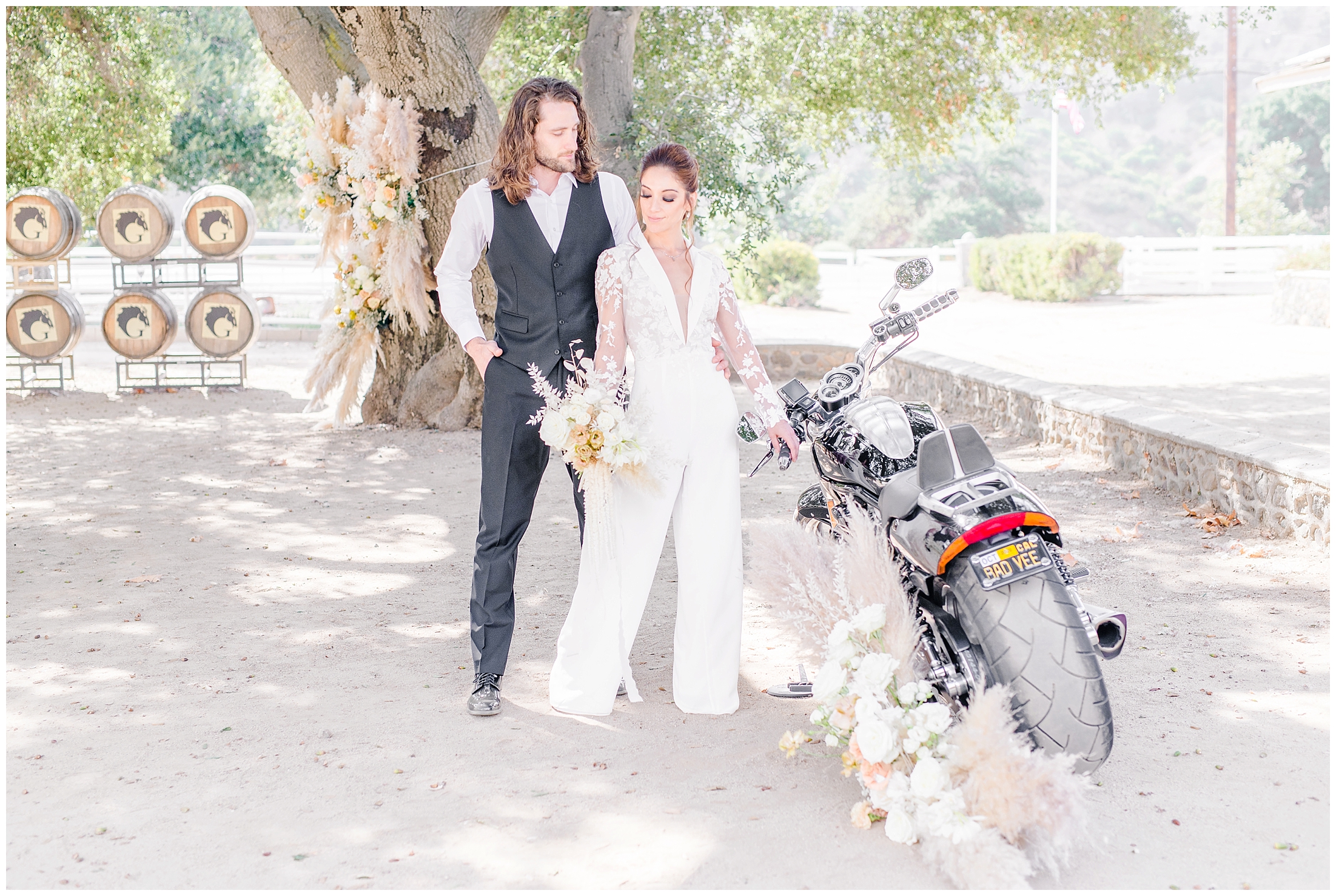 Bride and Groom next to a motorcycle